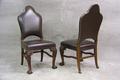 Italian dining chairs in leather with brass nail trim